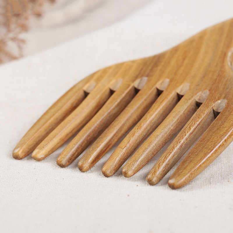 Wood comb-c669b546d36e9d90d7bb7da52a435176